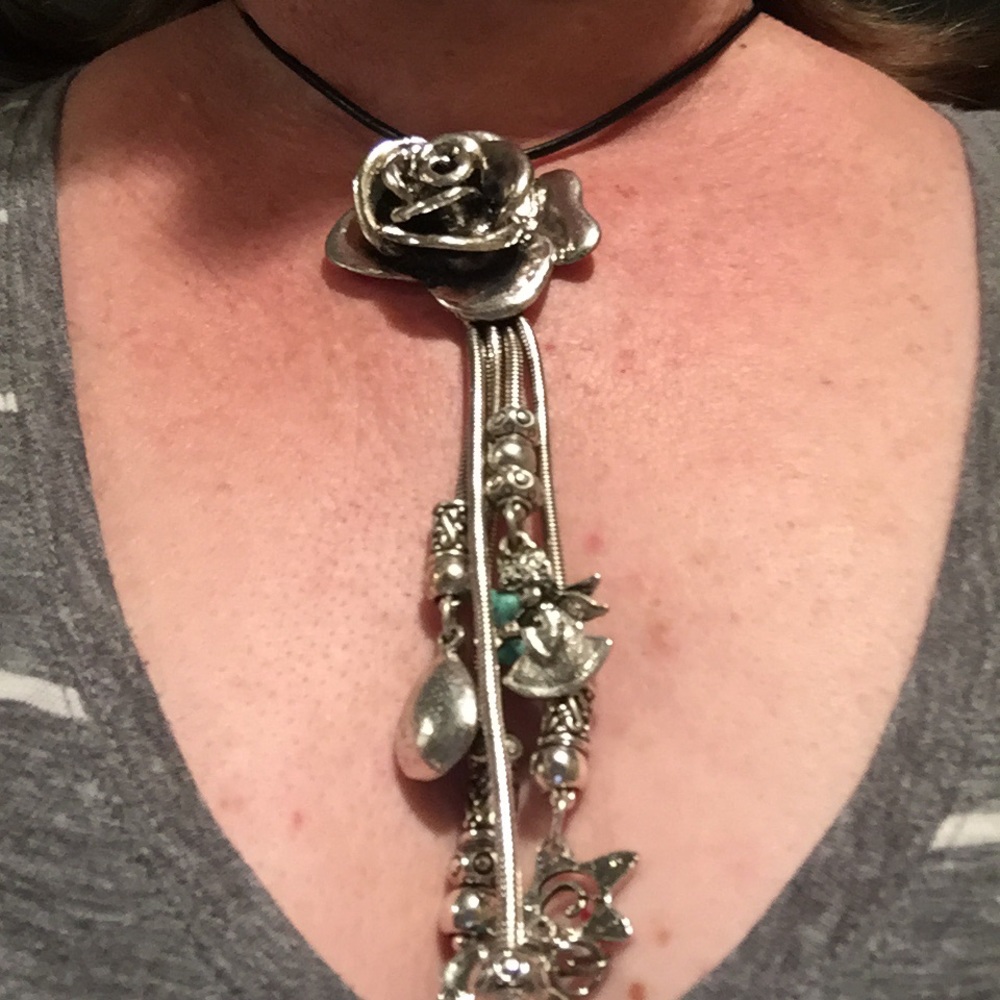 Turquoise and silver slide for necklace.